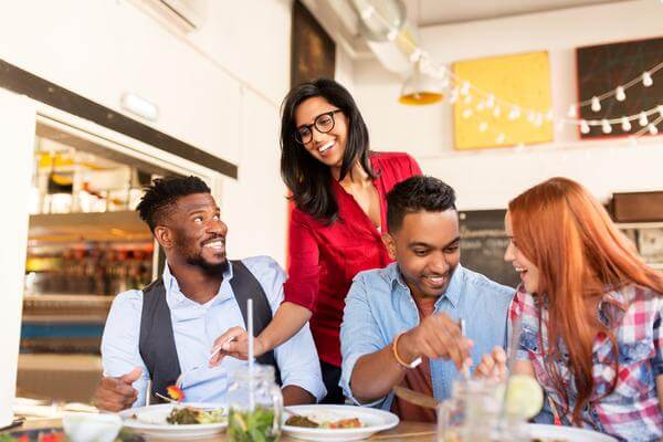 Friends enjoying a healthy meal together